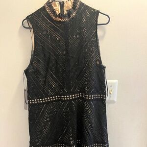 Black mid length dress, turtle neck